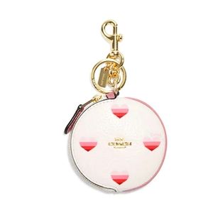COACH CIRCULAR COIN POUCH WITH HEART PRINT COLORS IM/CHALK PINK